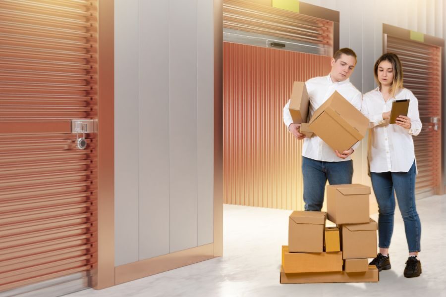 a couple organizing their self storage locker