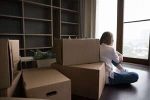 woman preparing boxes for storage