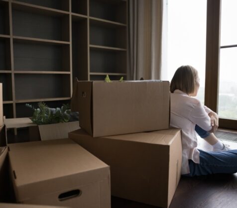 woman preparing boxes for storage